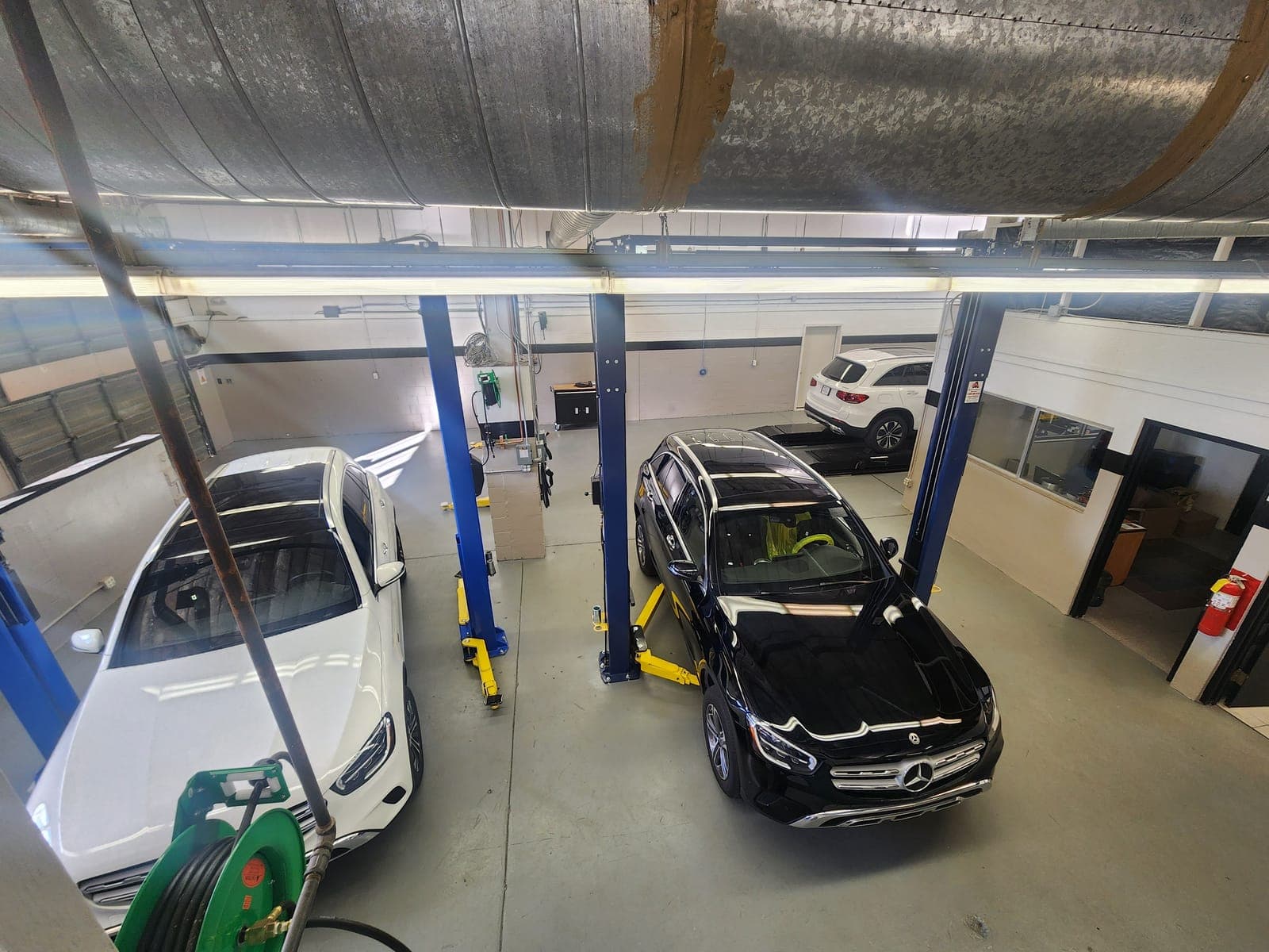 Overhead view of automotive service bays